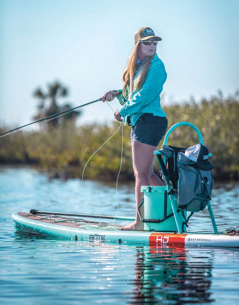 Vinoski paddle boards and fishes 