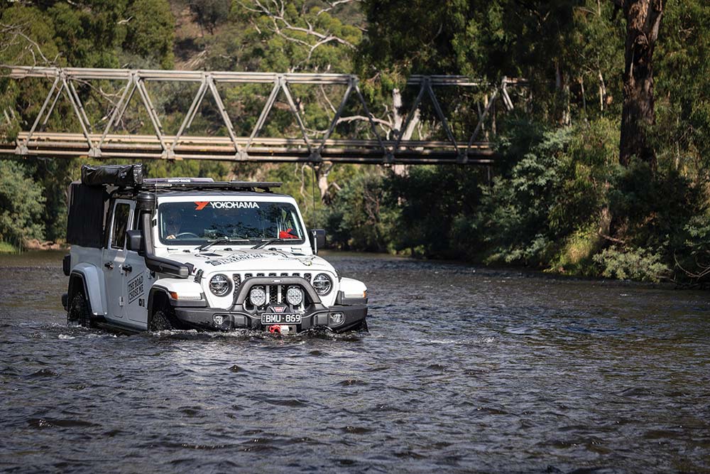 Jeep Gladiator driving in water