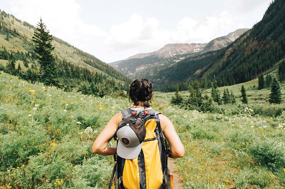 A woman hiking in the mountains