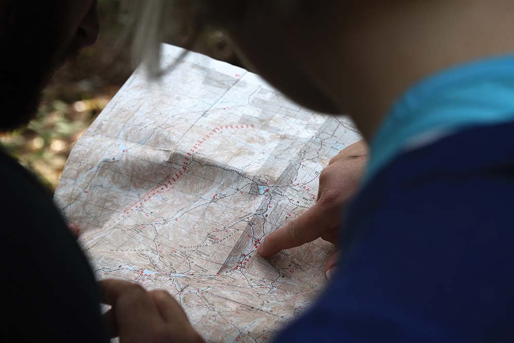 People reading a map