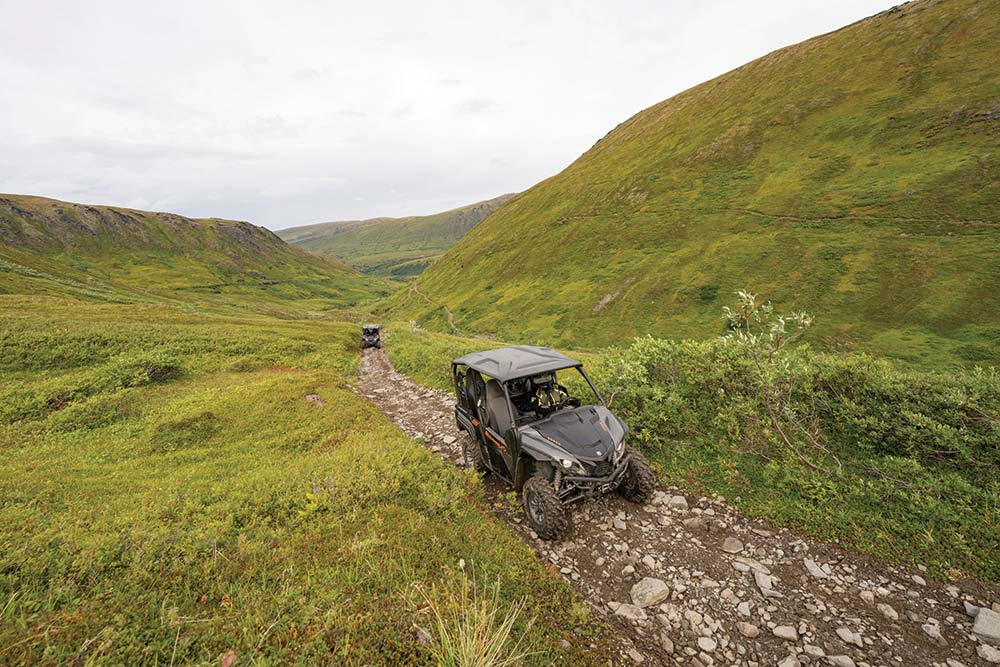 Two vehicles on the trail