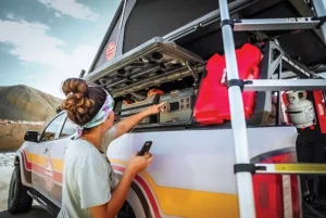 Sarah Girgis uses the Blackfire Portable Powerstation to charge her cell phone