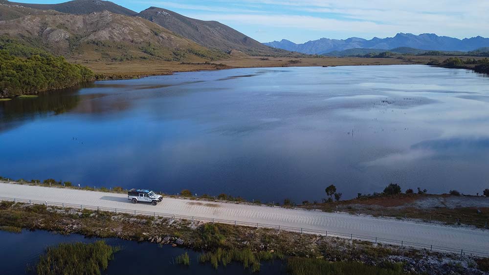 Rubicon on the road by a lake in Tasmania 