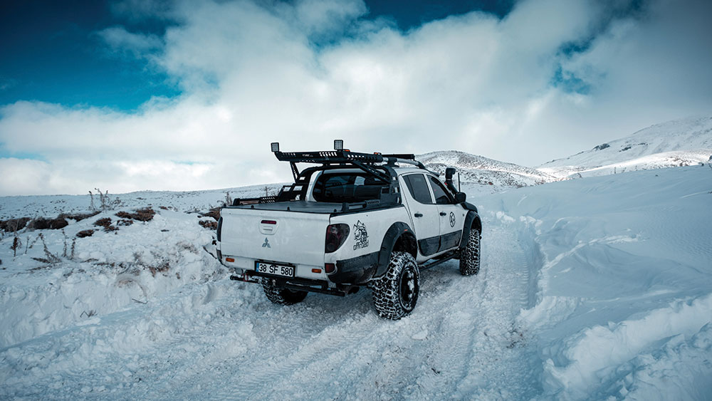 car on a snowy road 