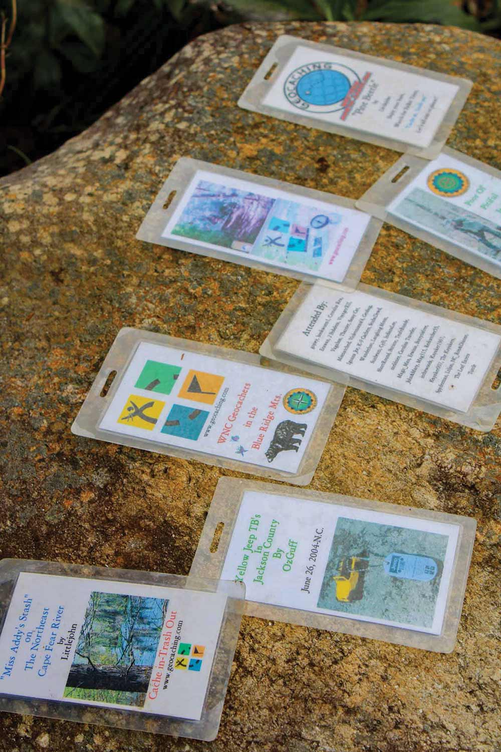 These laminated cards have captions and colorful pictures to congratulate cachers on their finds.