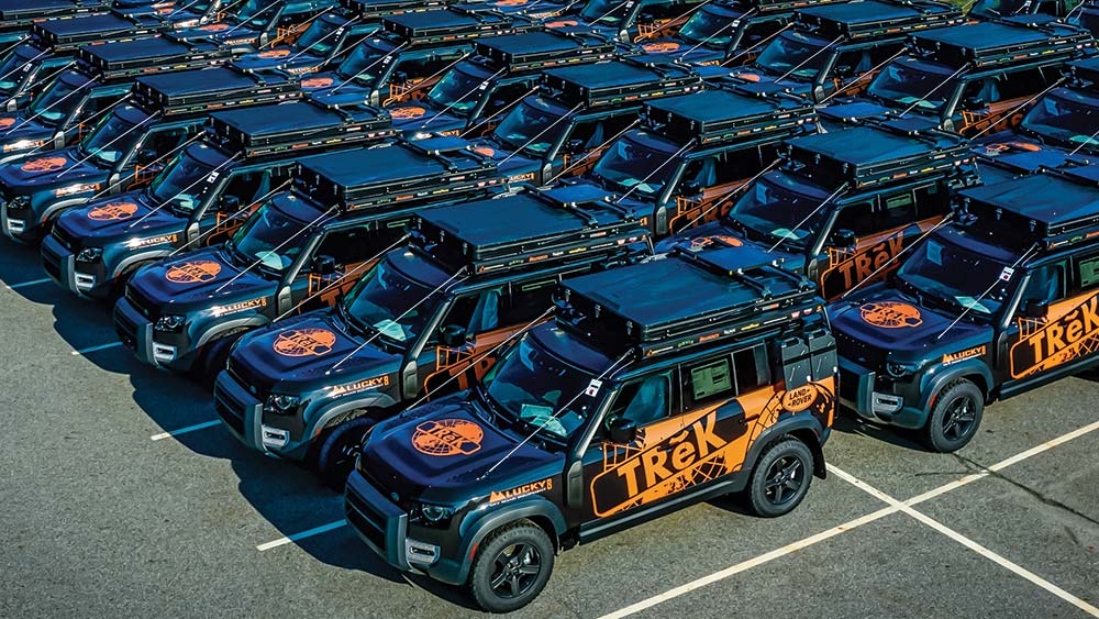 100 Limited Edition 2022 TReK Defenders parked on the lot.