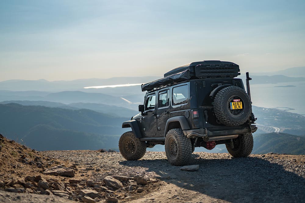 Today's Jeep Wrangler posed on a cliff, thanks to the work of Karl Probst.