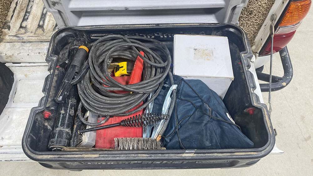 An Action Packer tote contains the author’s welding kit, extra tools, and a few spare parts.