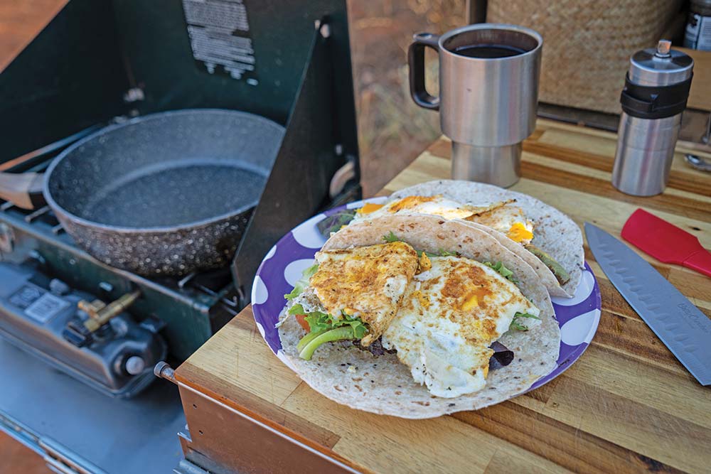 Breakfast laid out in a camp kitchen 