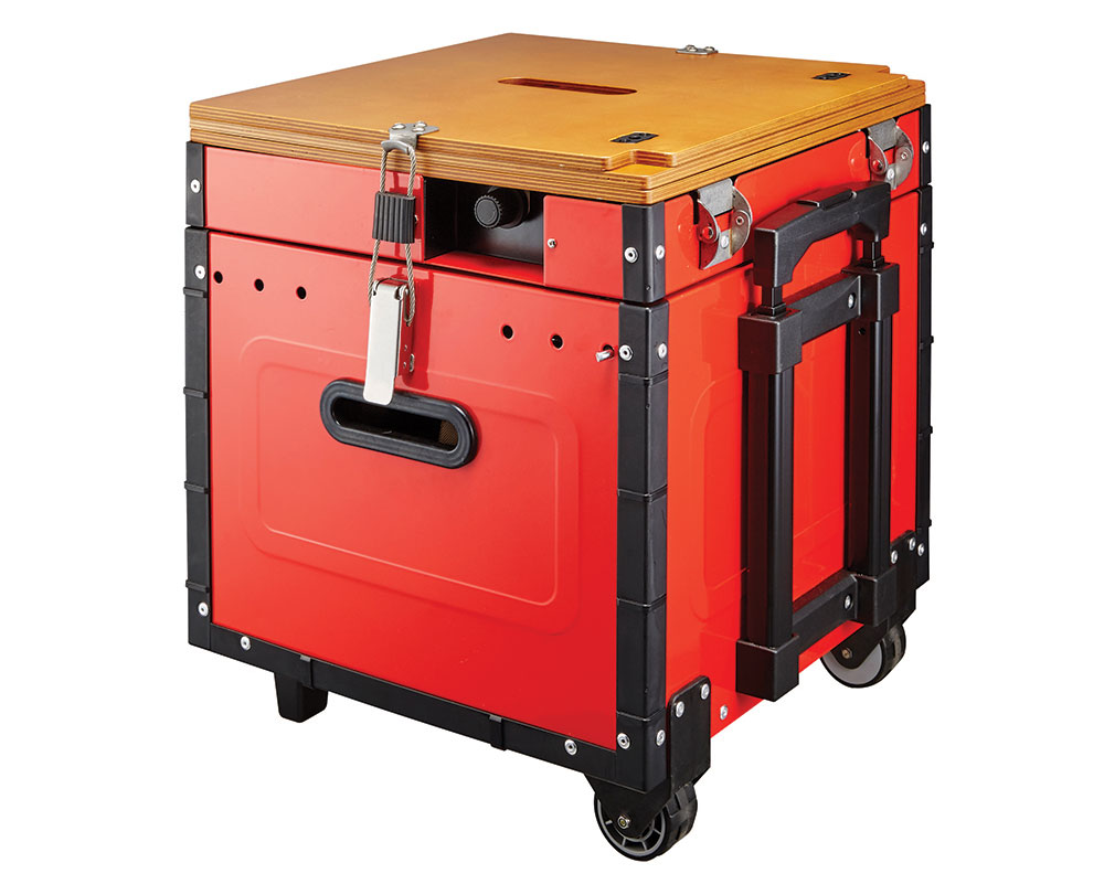 The camp kitchen folds up neatly into one box with wheels and multiple carrying handles.