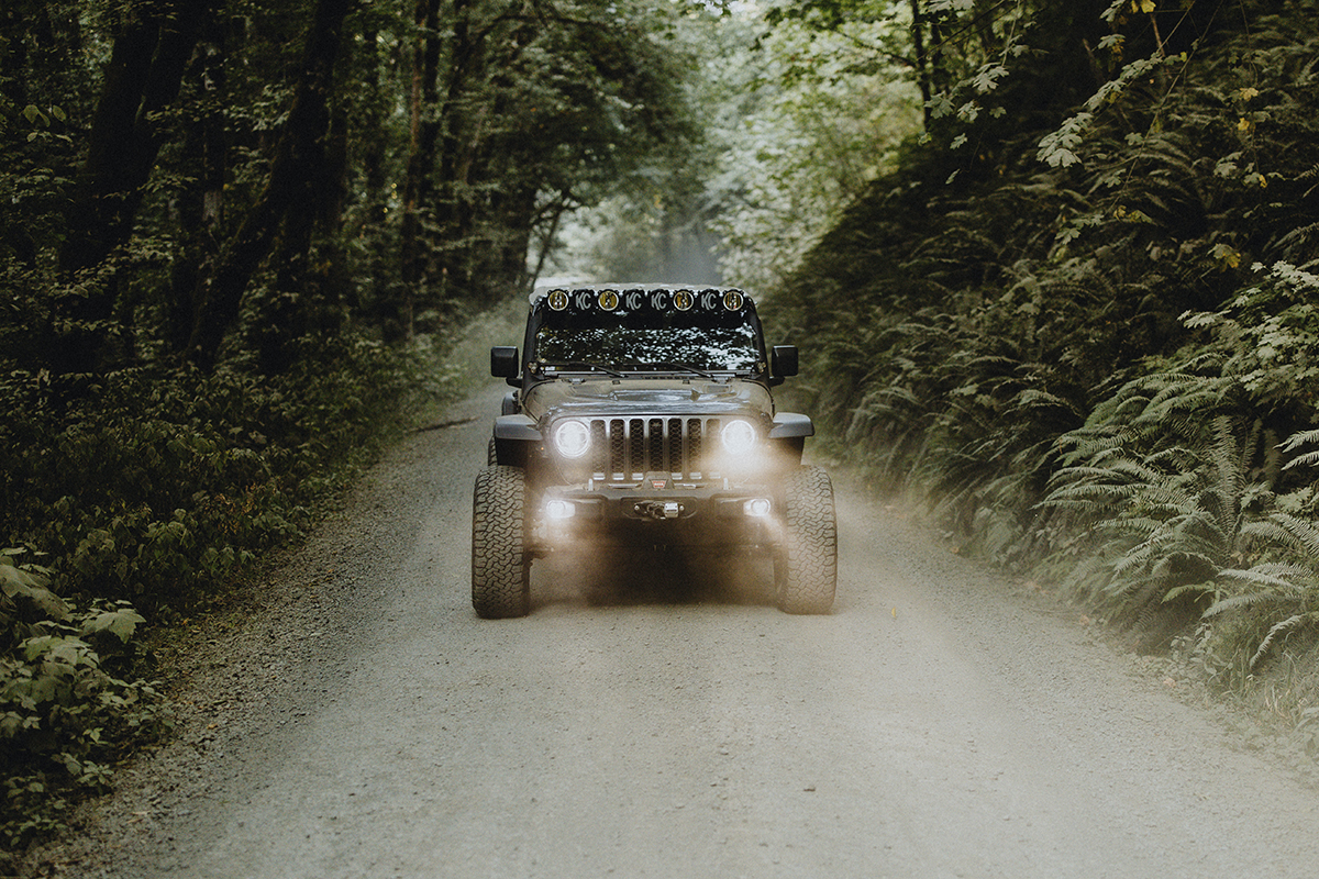 Jeep with headlights and fog lights on