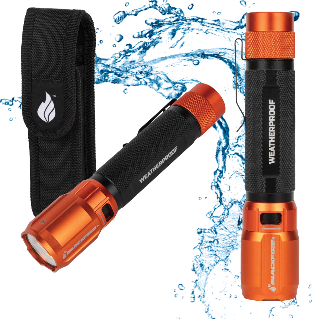 Orange and Black Flashlights on a white background with a black case and water behind 