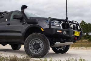 Gray Ford Ranger with Black Rhino wheels from the passenger side