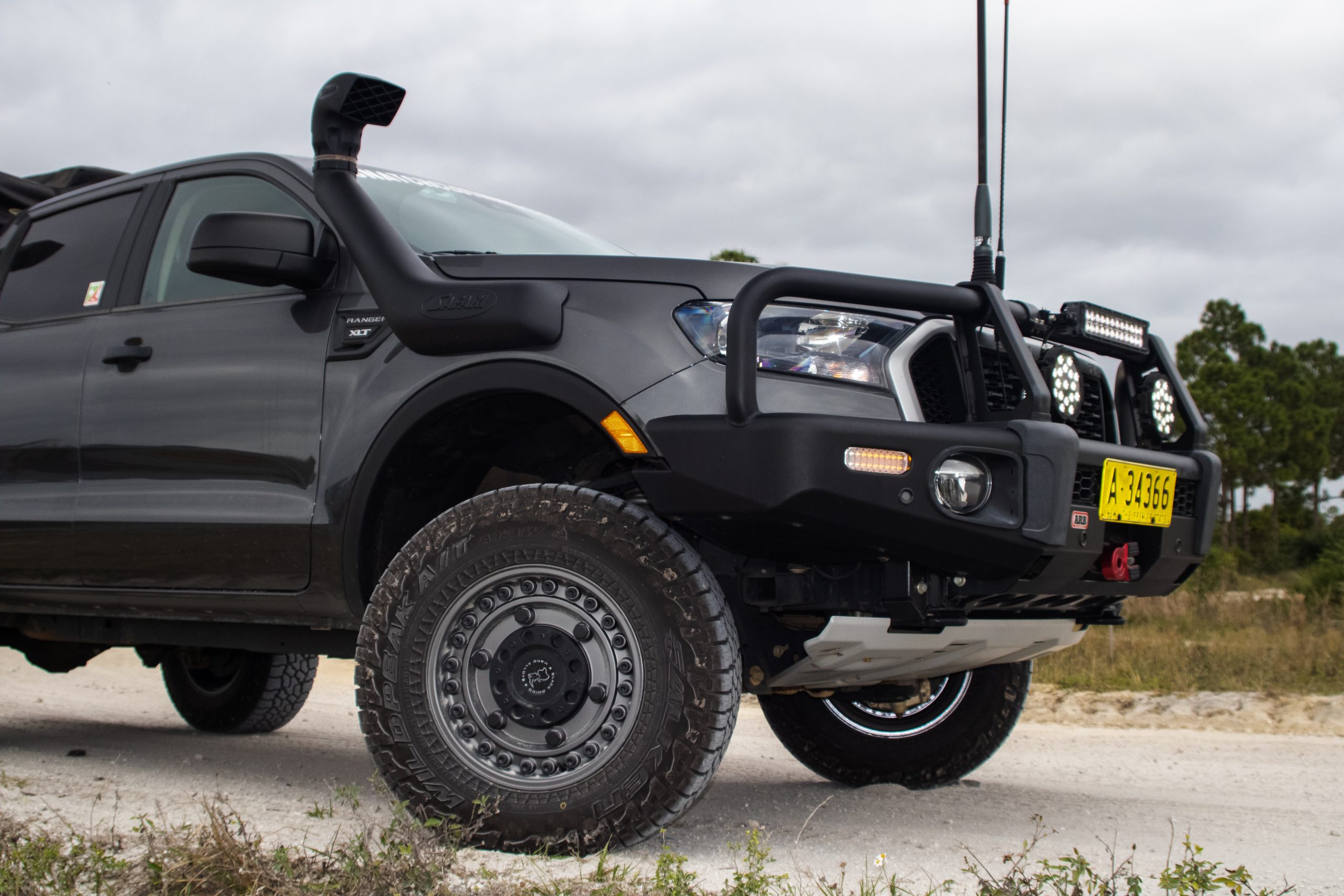 Gray Ford Ranger with Black Rhino wheels from the passenger side