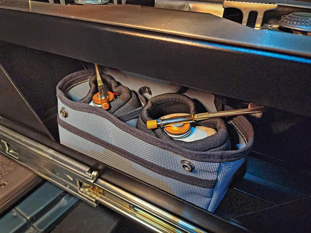 Fuel lines include a small twist dial to control the flame