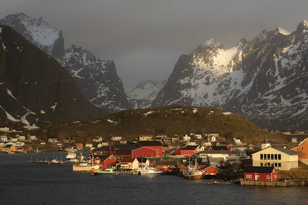 Lapping up a vibrant stormy light on the water in Lofoten